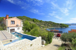 Seaside family friendly house with a swimming pool Cove Mikulina Luka, Korcula - 20116